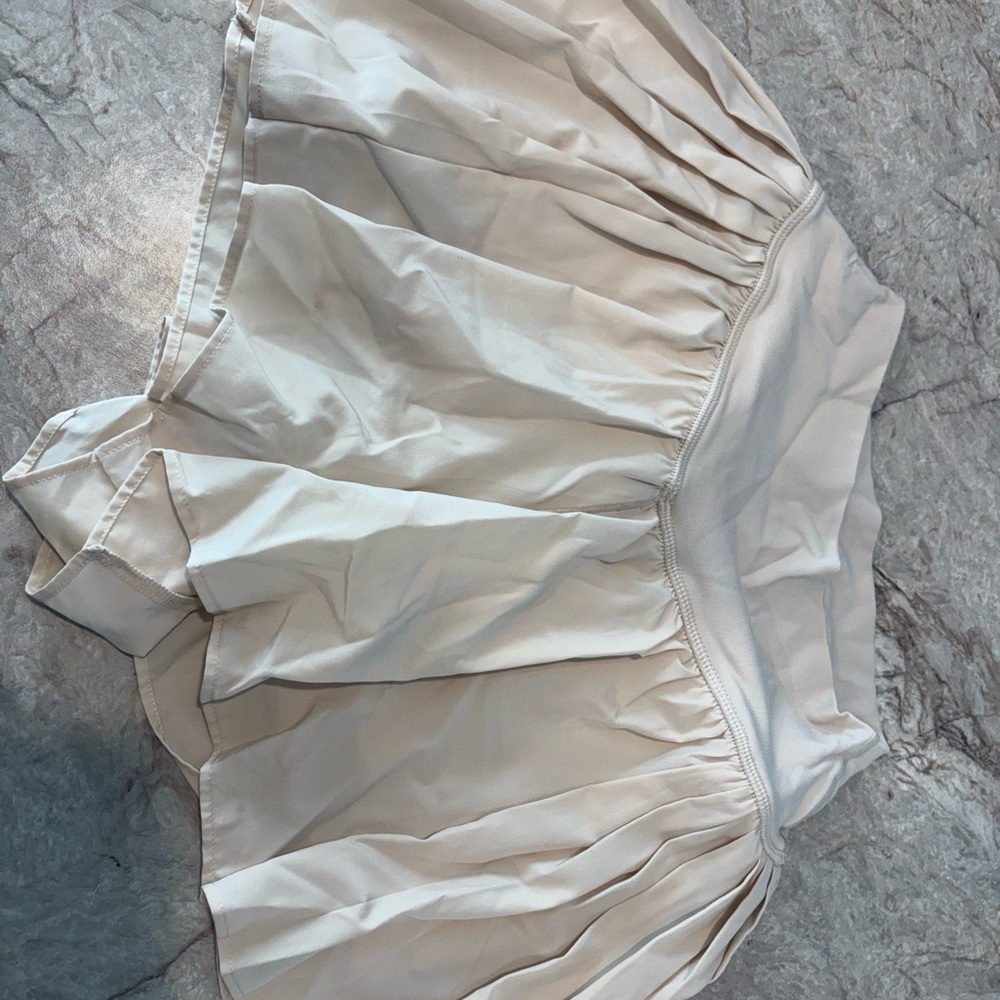 Women’s Cream Tennis Skort with Pleated Overlay